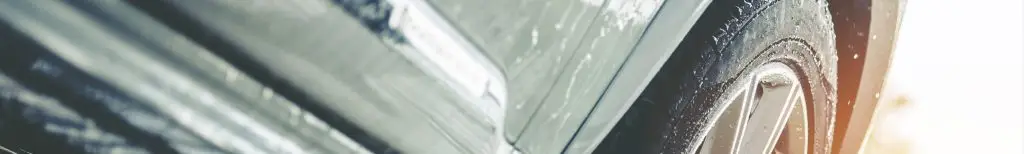 Close up of car wheels banner